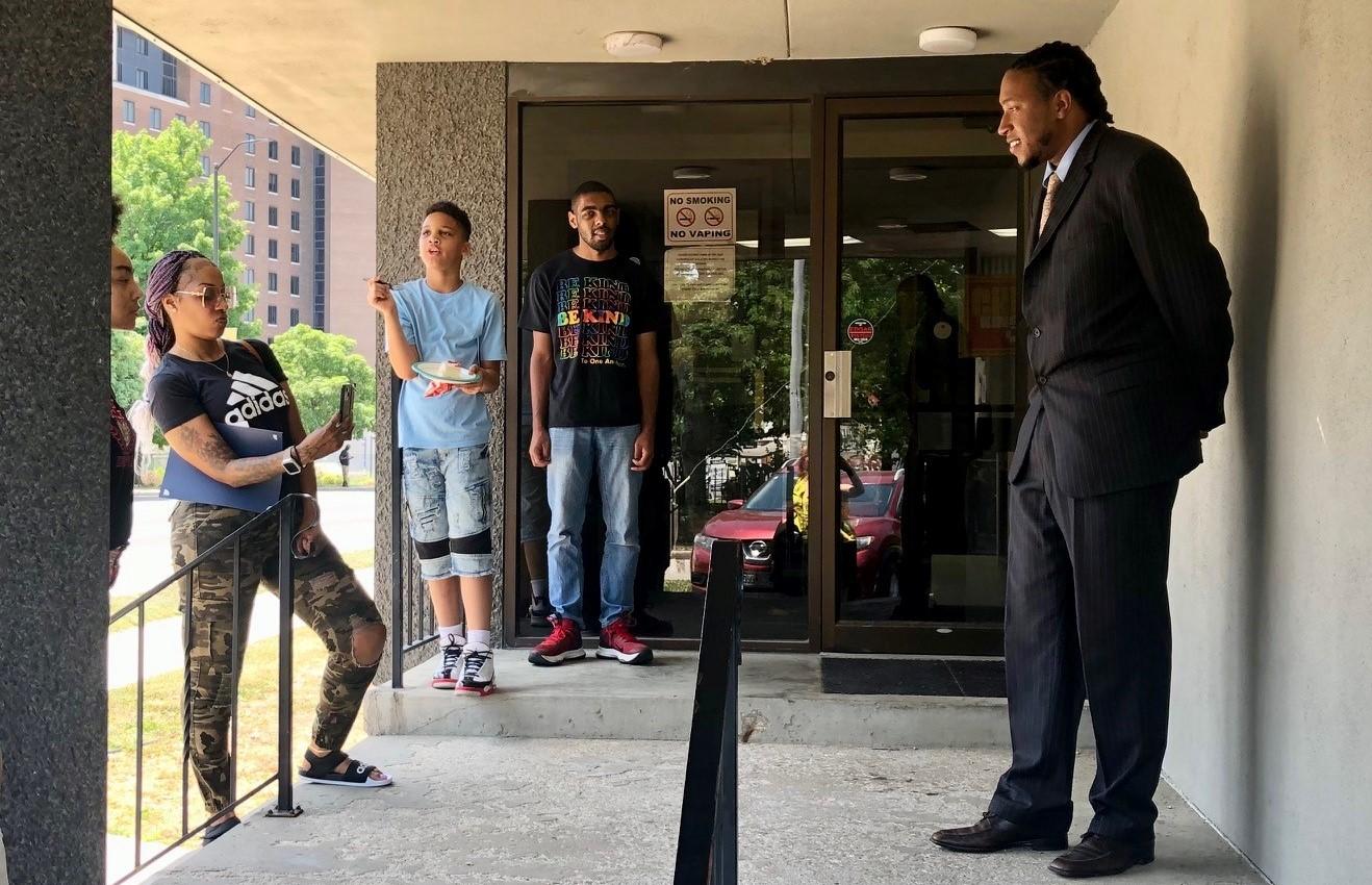 Students and guests gather outside Connections to Success in Kansas City